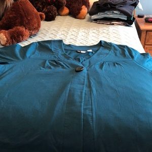 Teal elbow length blazer.